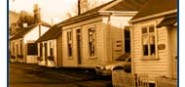 A sepia image of a historic home. 