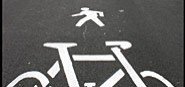A cycleway sign with bicycle and walker. 