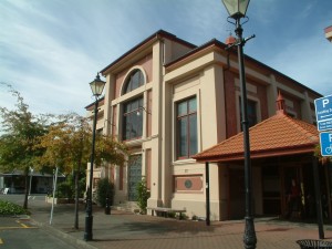 The exterior of a brick two storey building. 