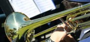 A musician playing a horn. 