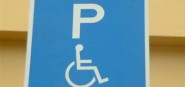 A blue mobility car park sign. 