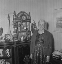 Black and white photo of Ralphine Richardson standing in a dress. 