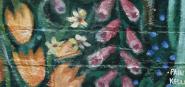 A green, pink and orange floral painting. 