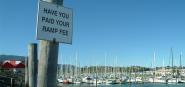 A marina with a directional sign. 