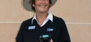 A smiling parking warden. 