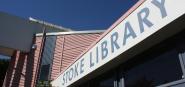 The exterior and sign of Stoke Library. 
