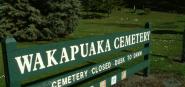 A sign indicating Wakapuaka Cemetery. 
