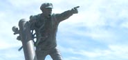 Sculpture of mariner pointing to sea, Sunderland Pier, Nelson